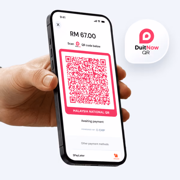 A phone displaying DuitNow QR code.