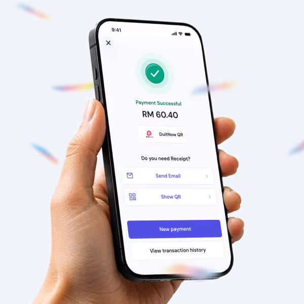 A phone displaying payment completed with confetti.